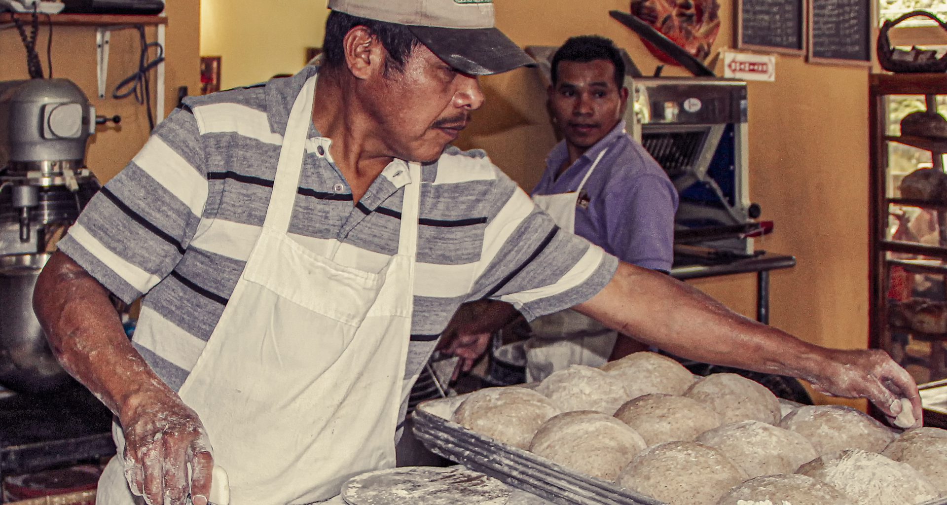 man making bread dough